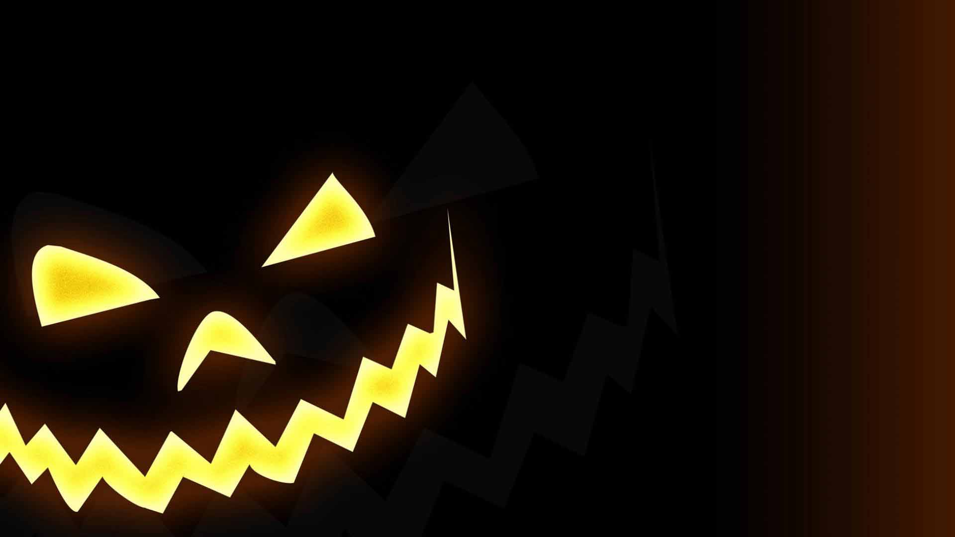 Free photo Creepy pumpkin on a black background