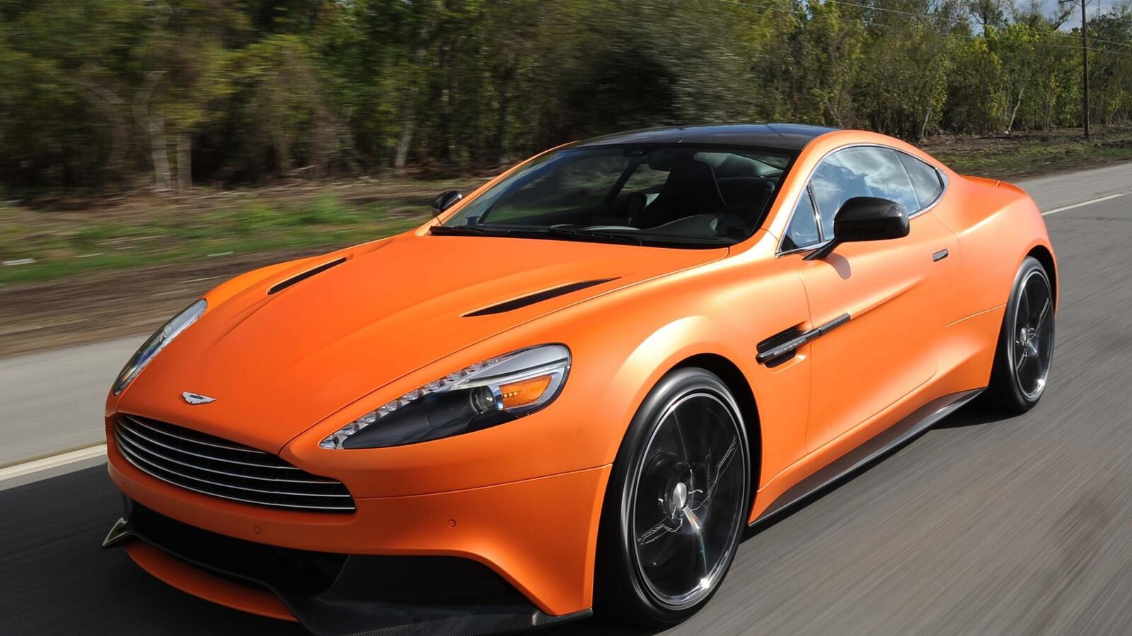 Обои Aston Martin авто оранжевый на рабочий стол