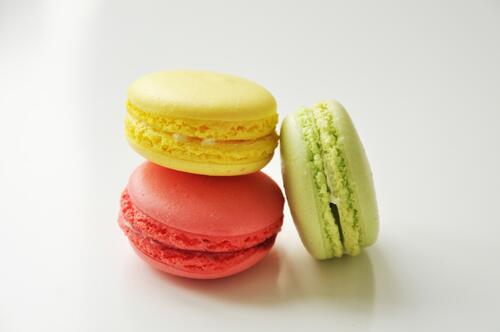 Colored macarons on a white background