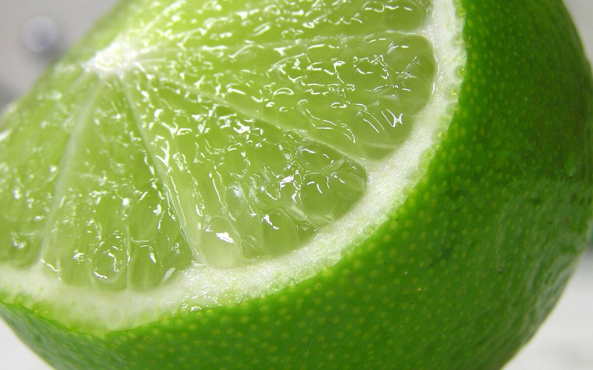 A close-up of a lime in a section