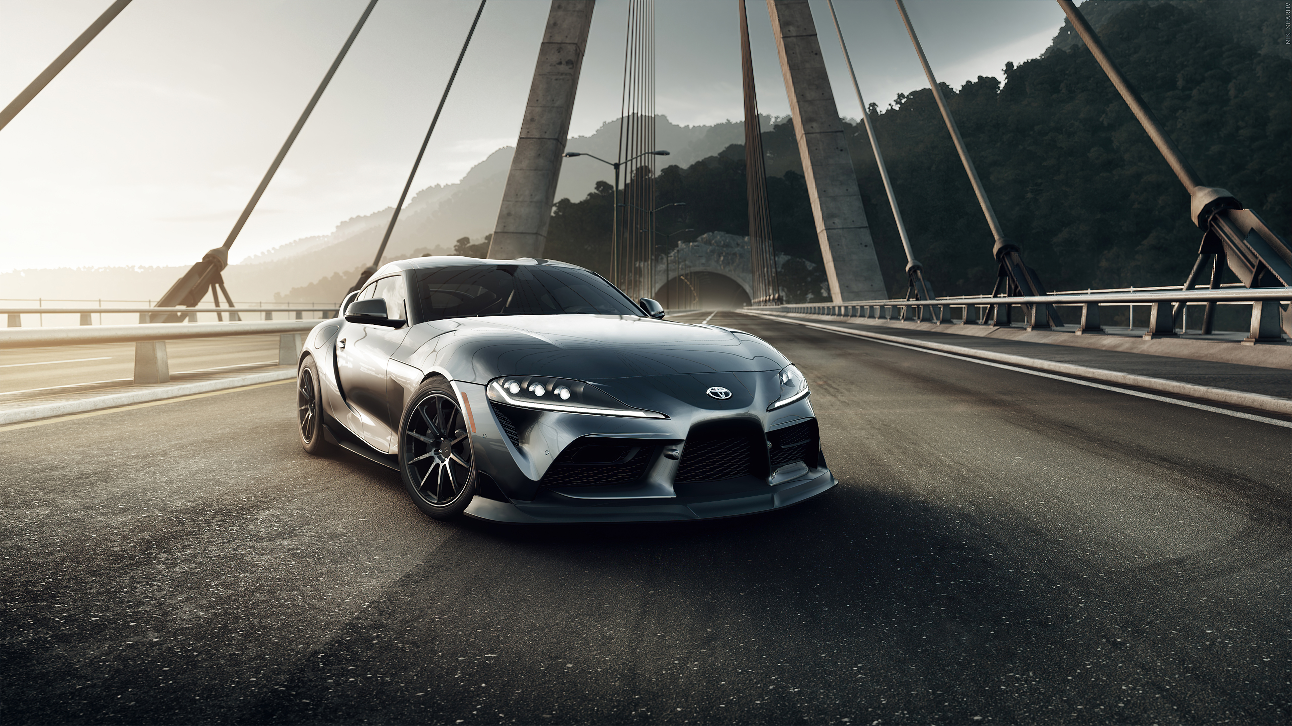 Free photo The Toyota Supra is standing on a bridge