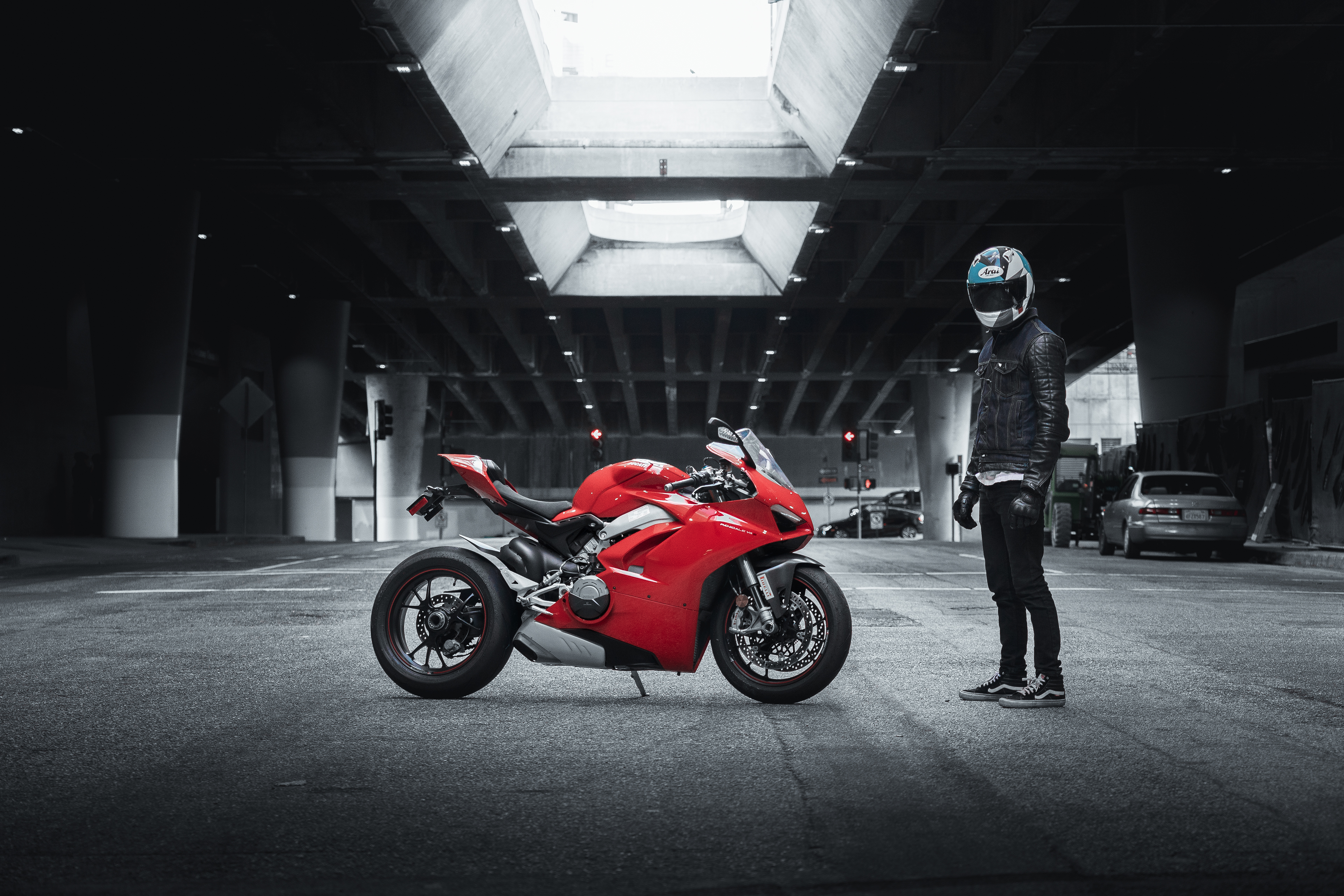 A red Ducati in a monochrome photo