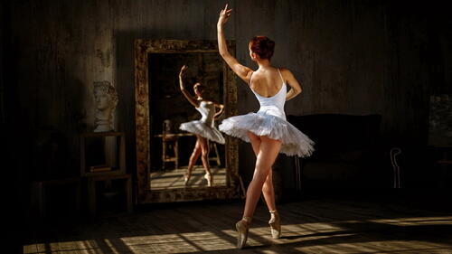 Photo of a ballerina and a mirror