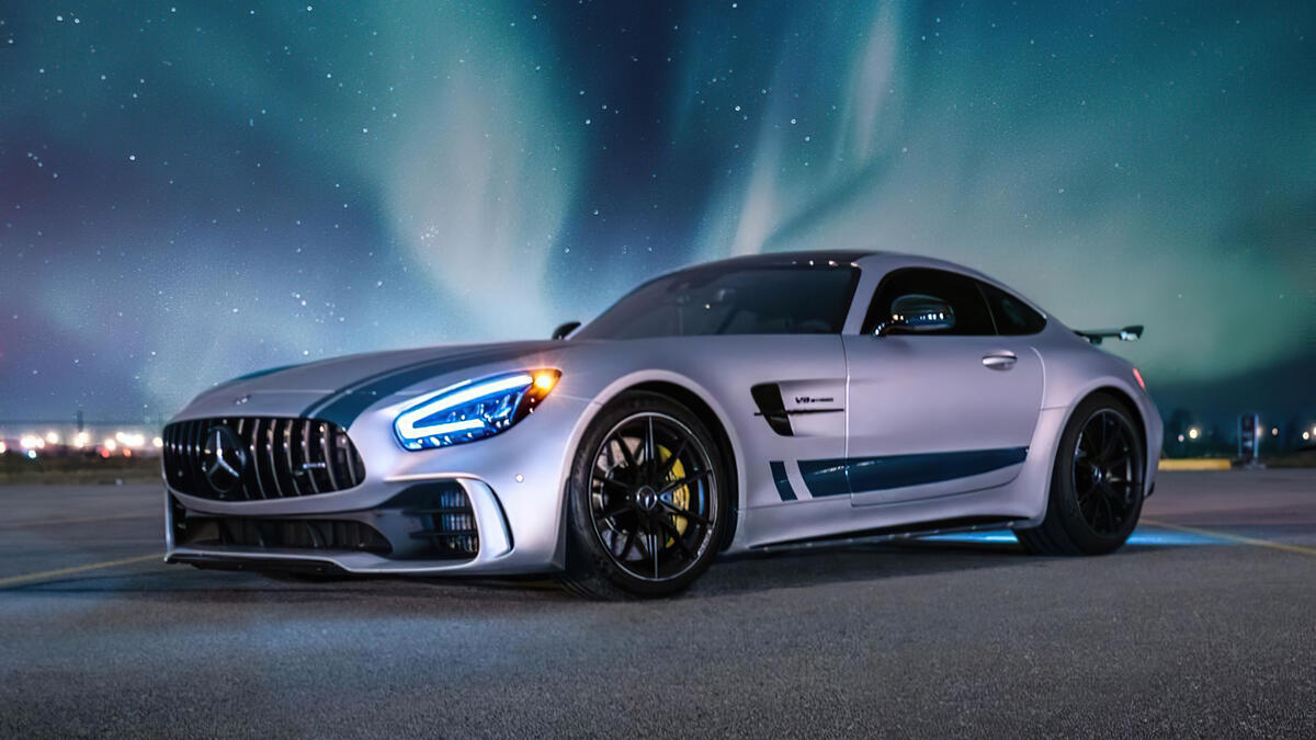 Mercedes Benz AMG against the night sky.