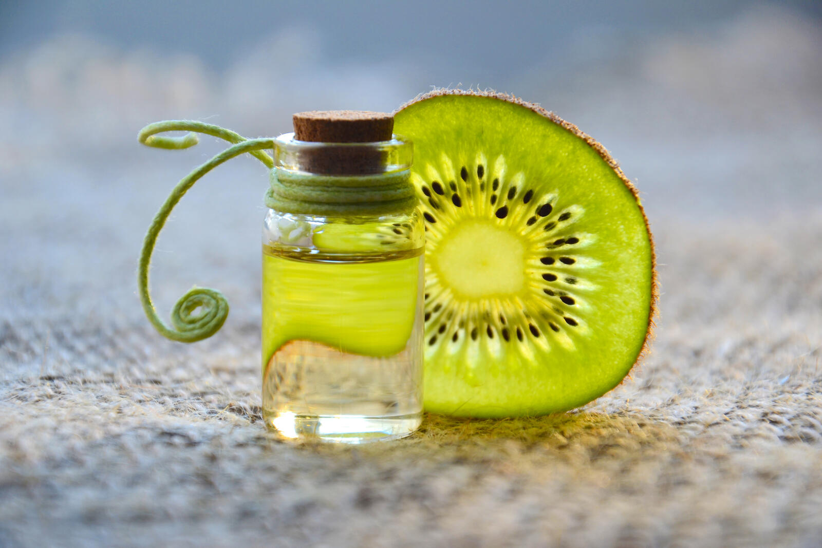Wallpapers cosmetic oil kiwi essential oil on the desktop