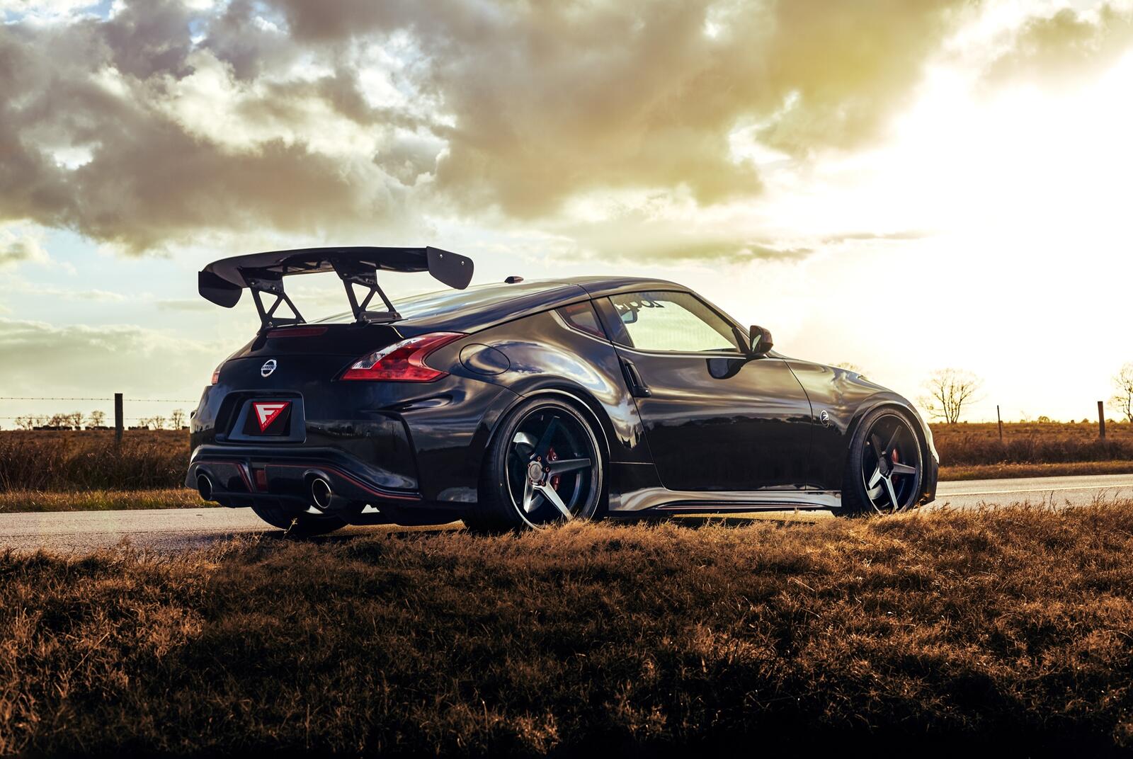 Wallpapers side view clouds nissan nismo 370z on the desktop