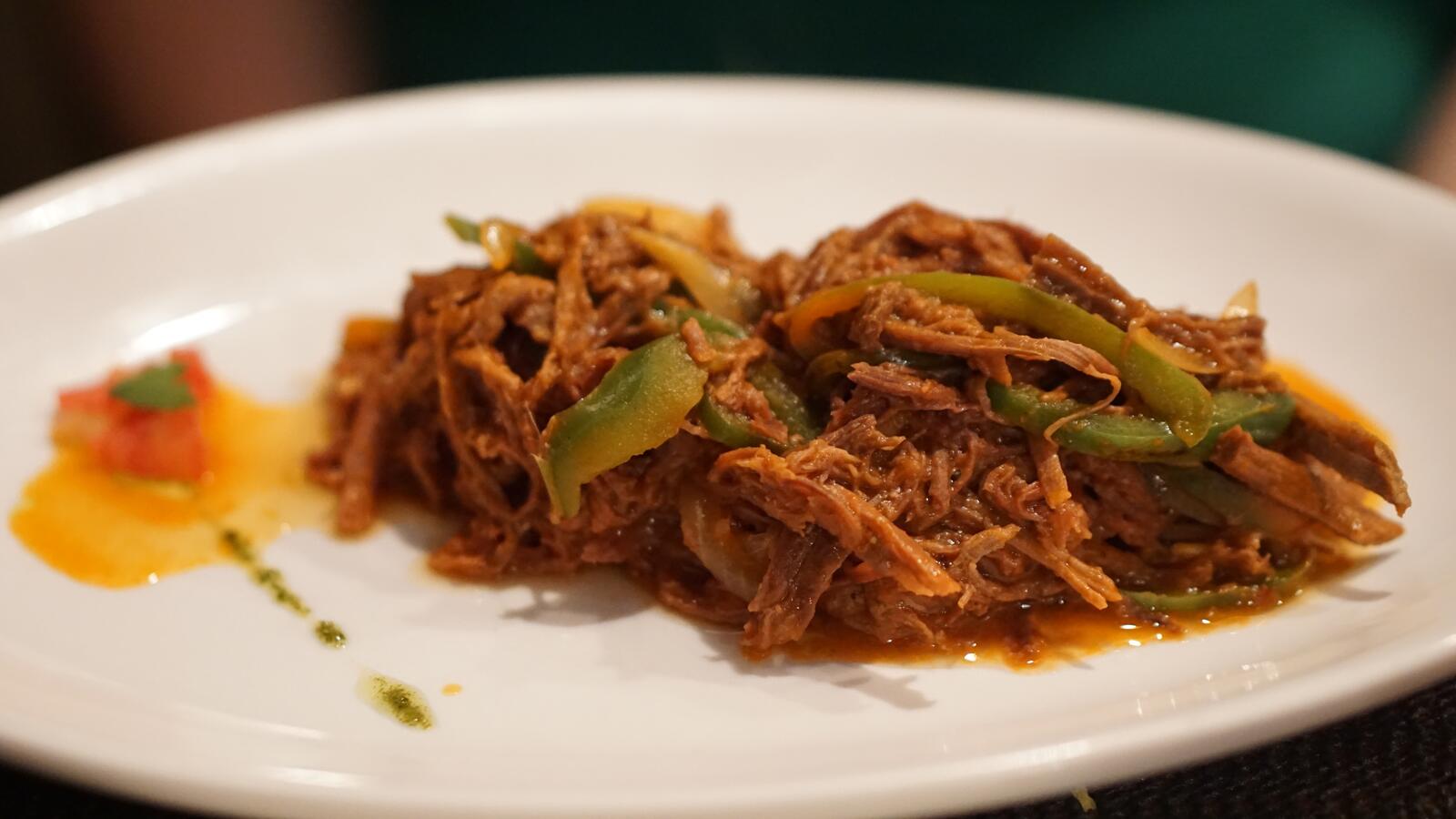 Free photo Braised cabbage and beef on a white plate