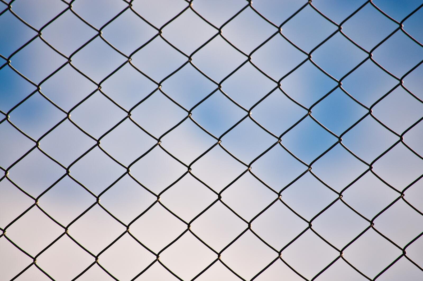 Wallpapers fence pattern clouds on the desktop