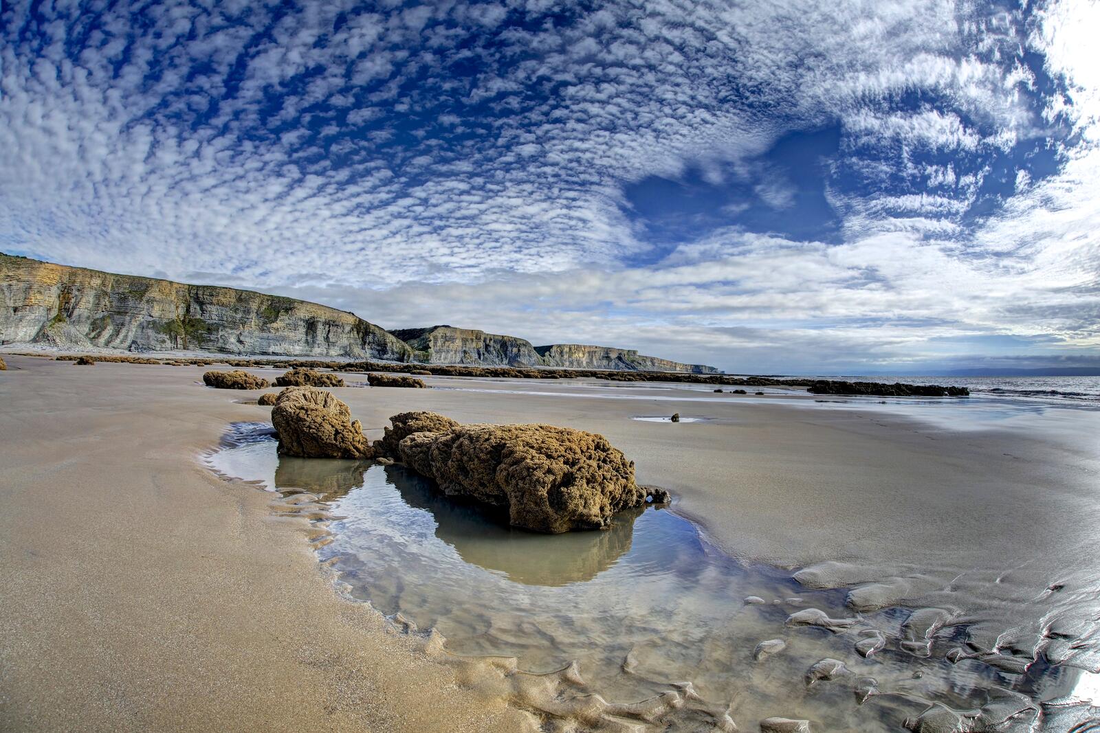 Обои Великобритания песчаный пляж облака на рабочий стол