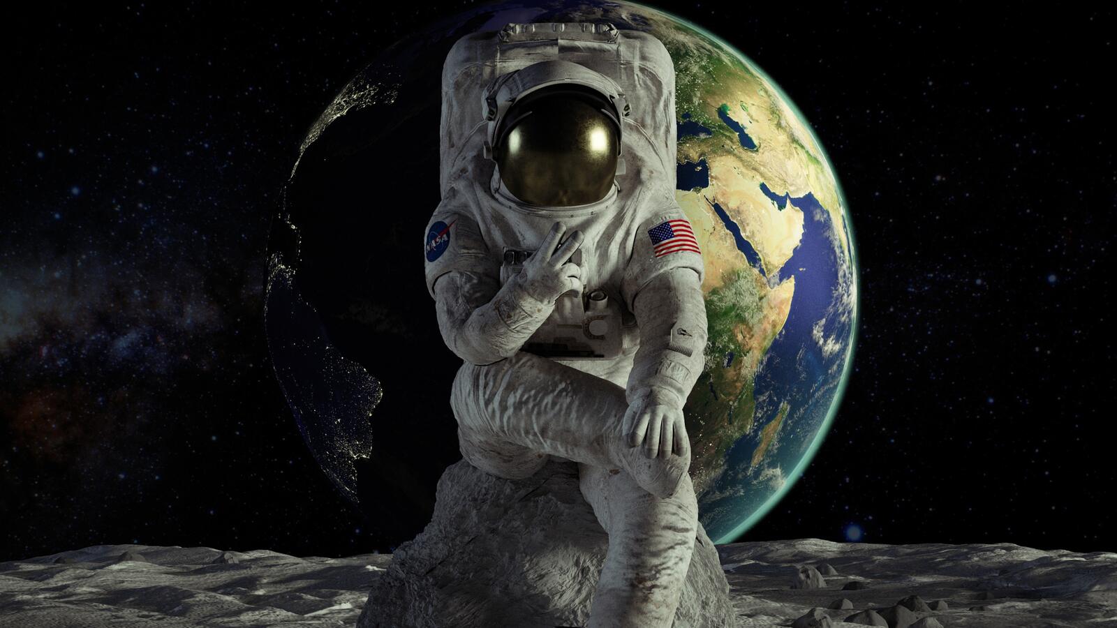 Бесплатное фото Американский космонавт на фоне планеты земля