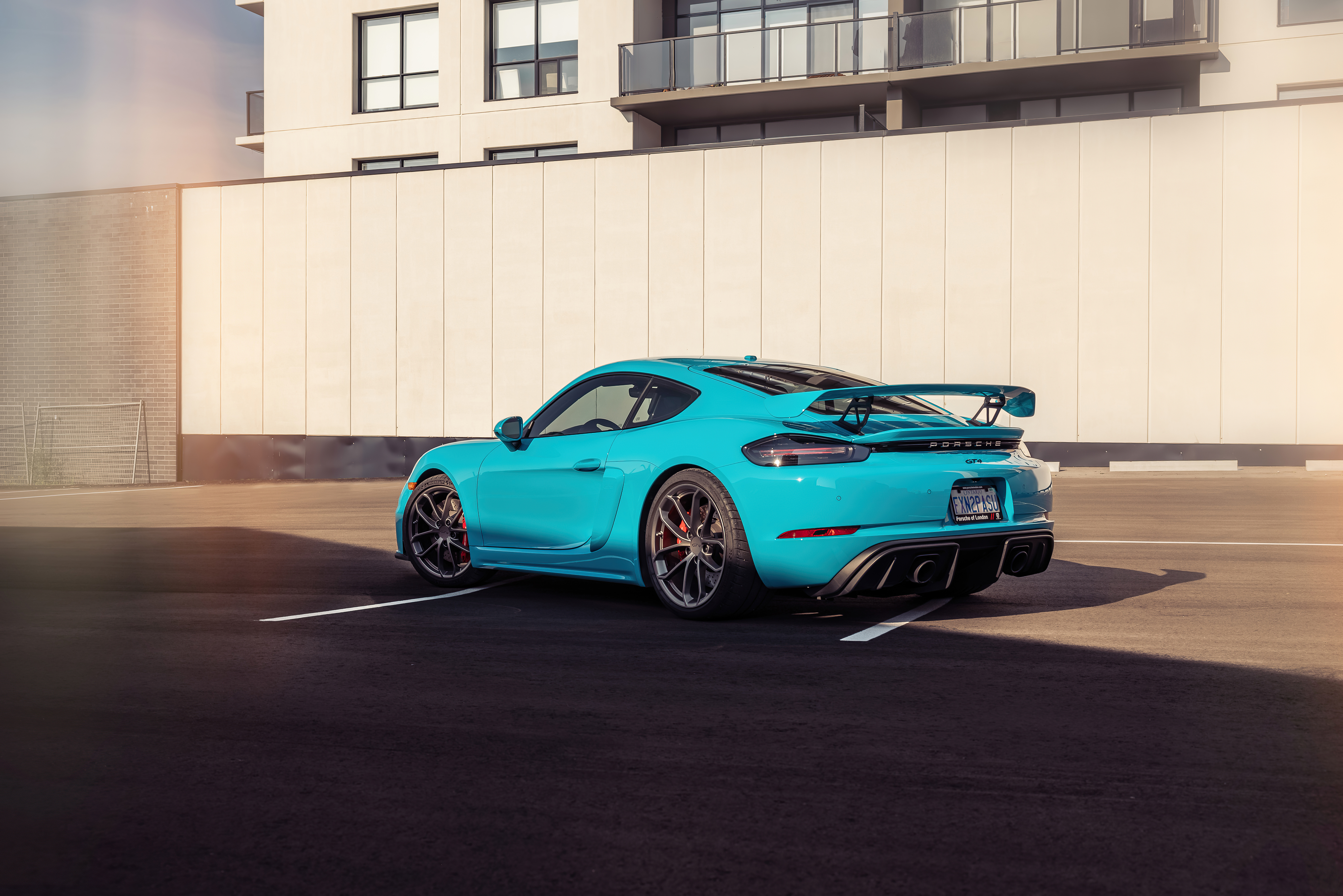 Free photo Porsche Cayman in a beautiful blue color.