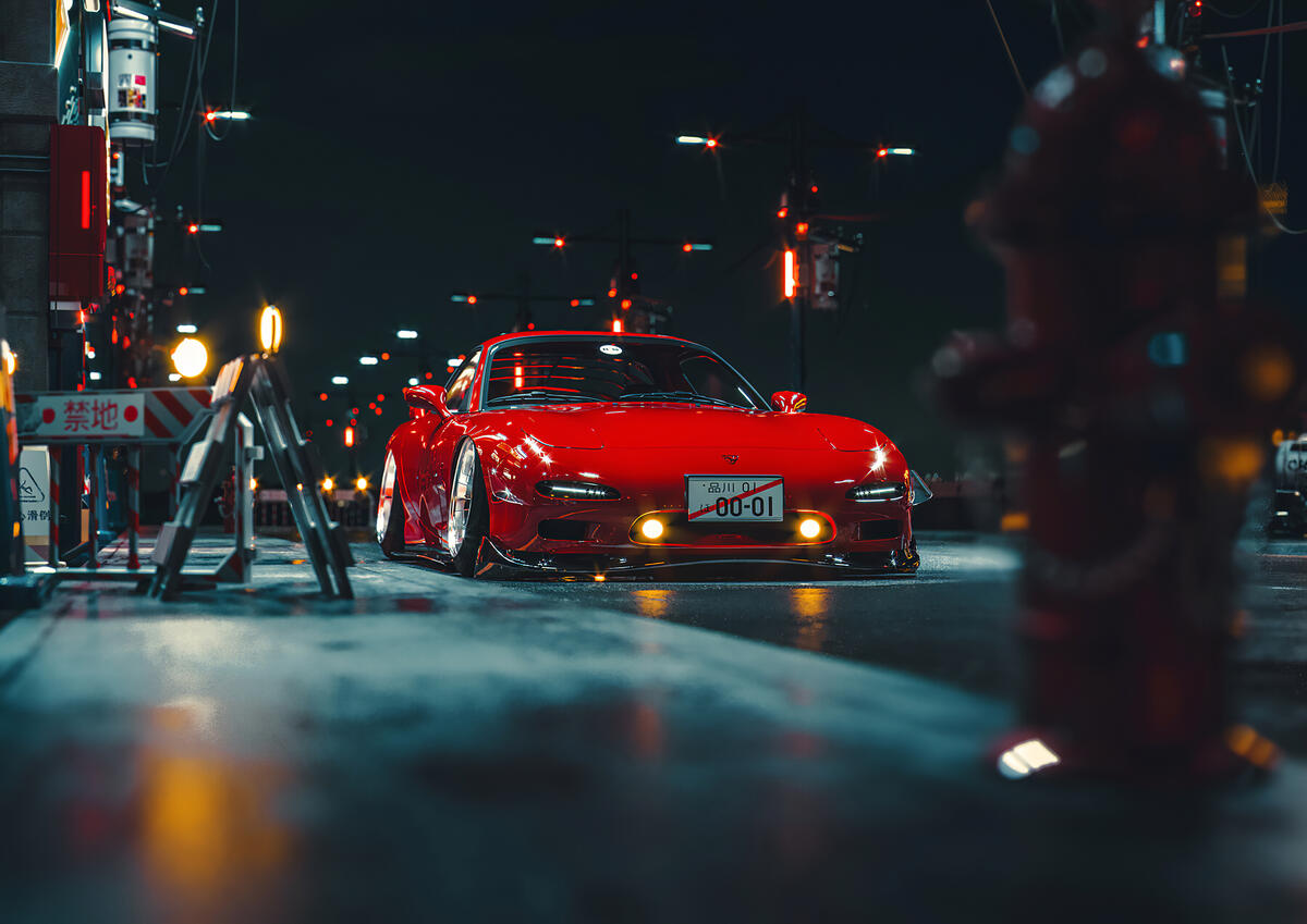 Красная Мазда RX7 стоит на улице ночного города