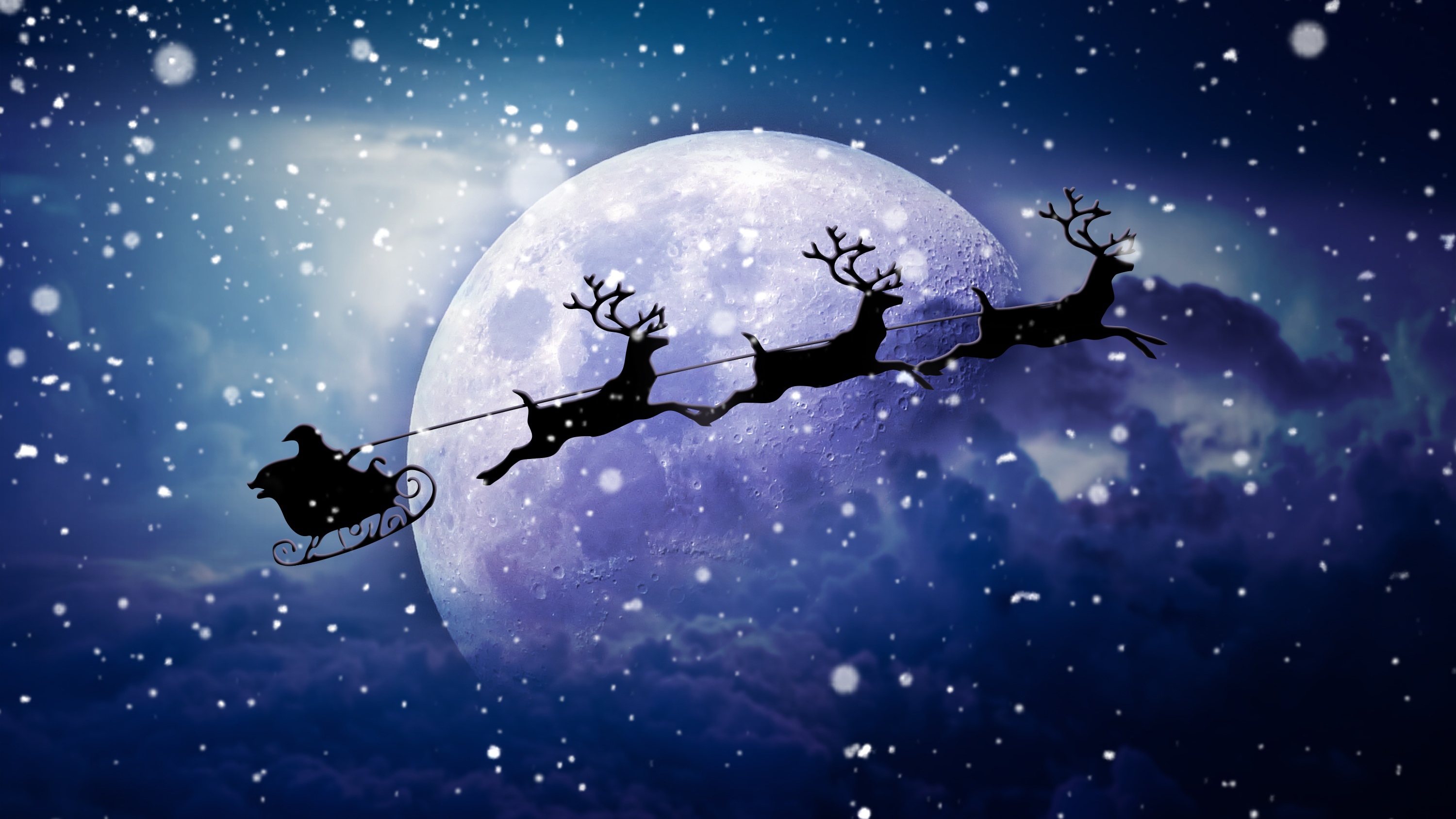 免费照片壁纸 月亮背景上的圣诞老人与驯鹿剪影