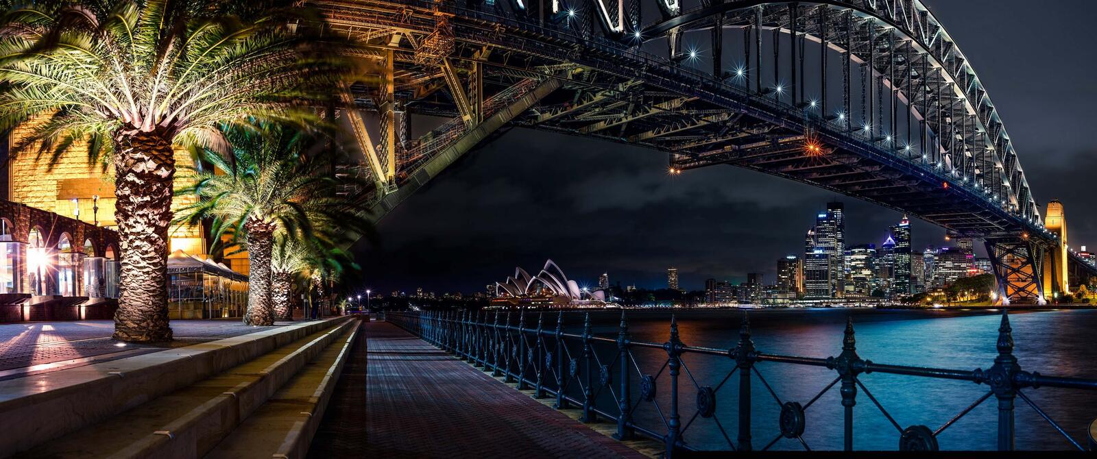 Free photo Night bridge over the river to Sydney