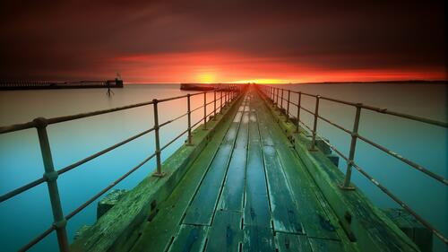 Wooden pier and sunset