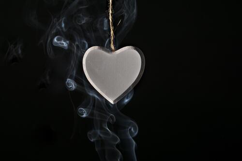 Locket heart in smoke