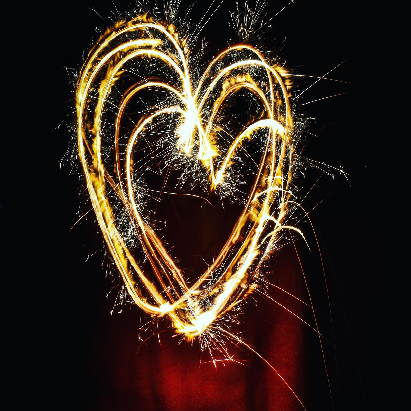 Free photo A heart of sparklers