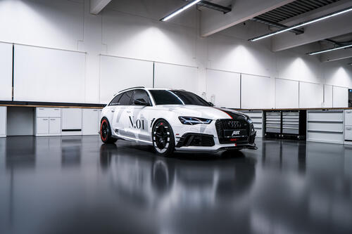 Audi in a big, bright hangar