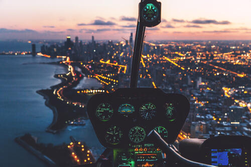 View of the evening city from a helicopter