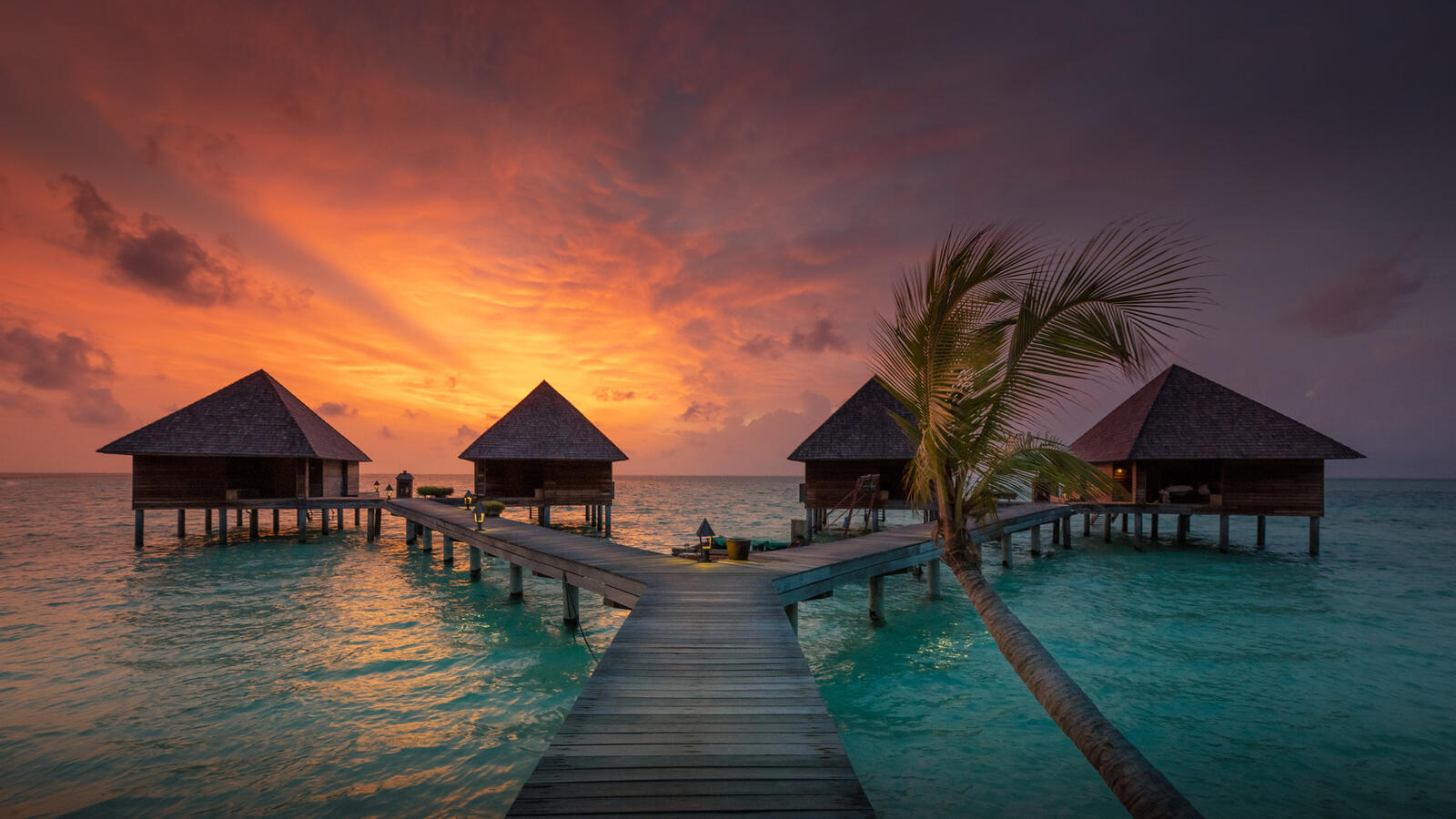 Wallpapers sunset bungalows on water sea on the desktop