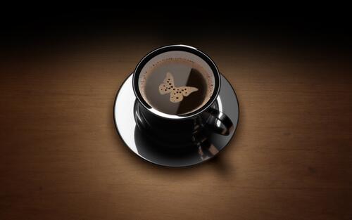Бабочка на кофейной пенке