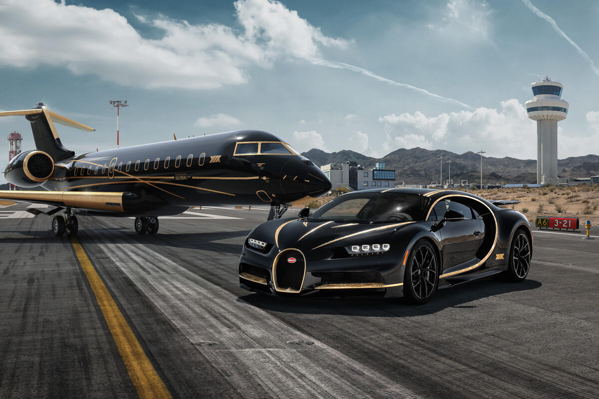 Bugatti Chiron and airplane in the same black and gold style
