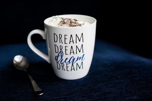 A mug that says (Dream)
