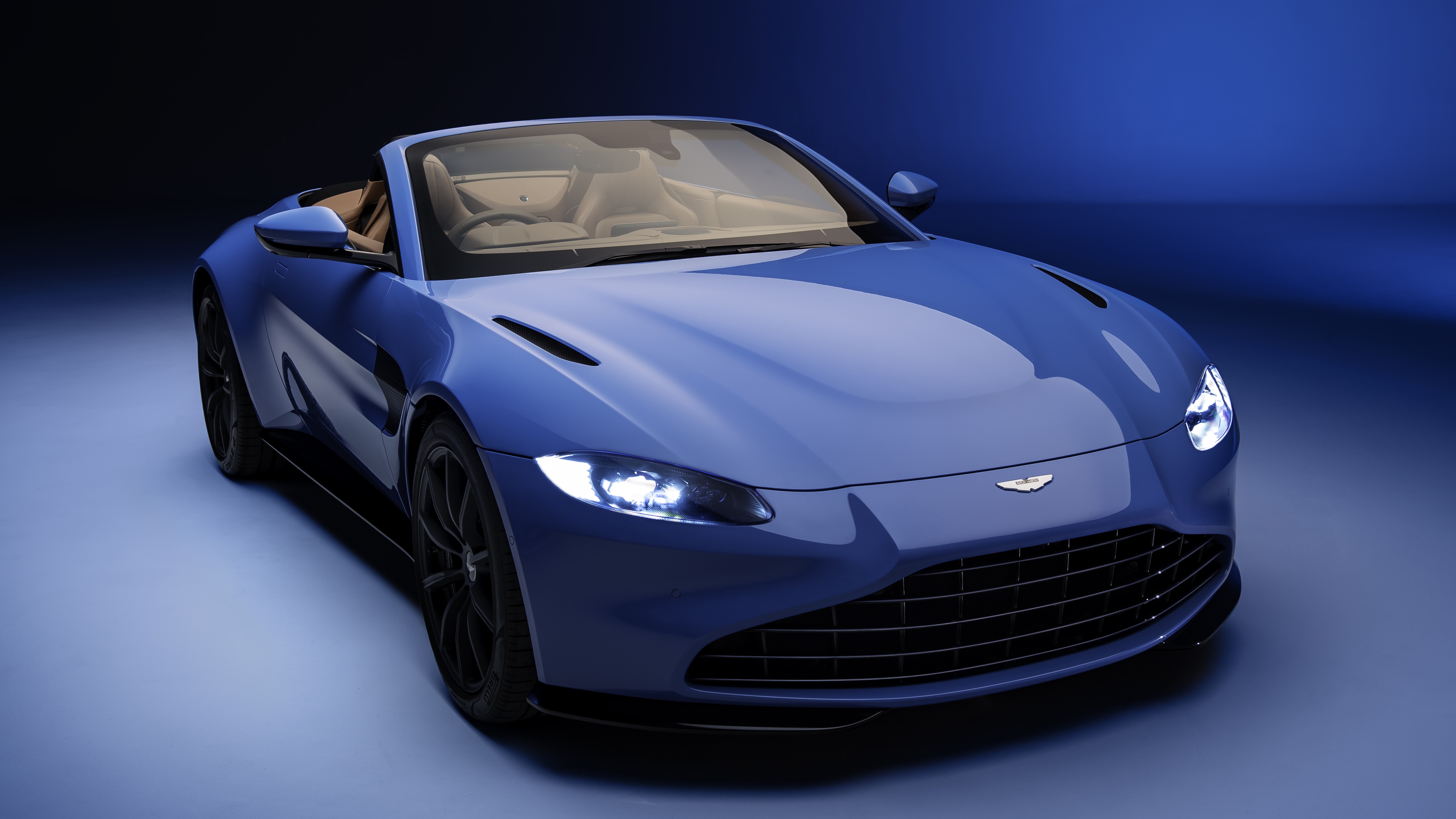 Обои Aston Martin Vantage Roadster передний план синий на рабочий стол
