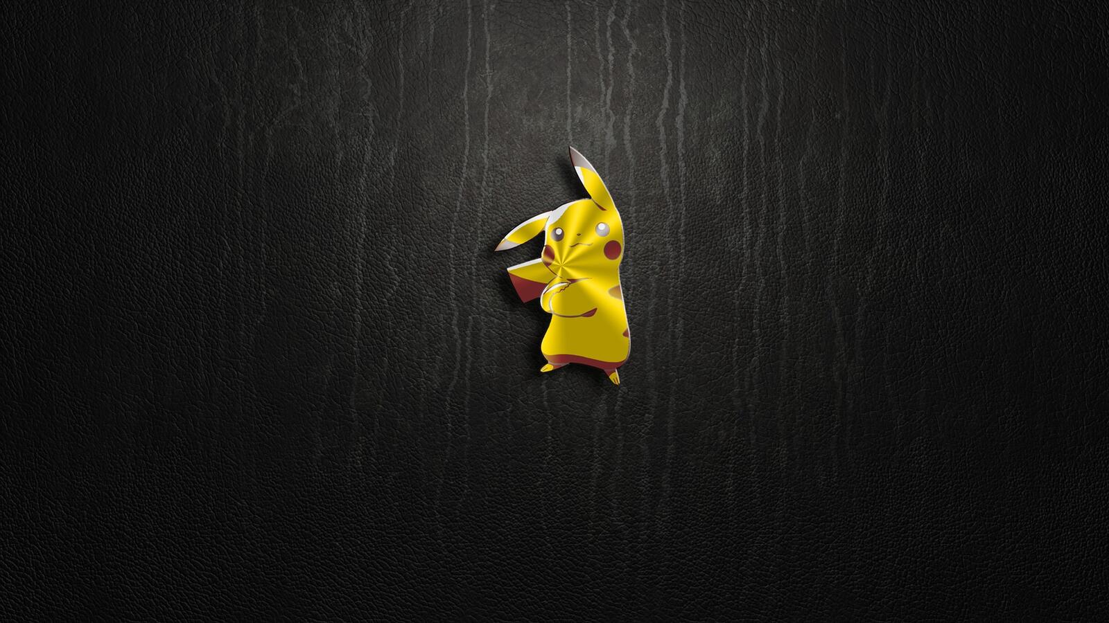 Free photo Pikachu keychain on a black background