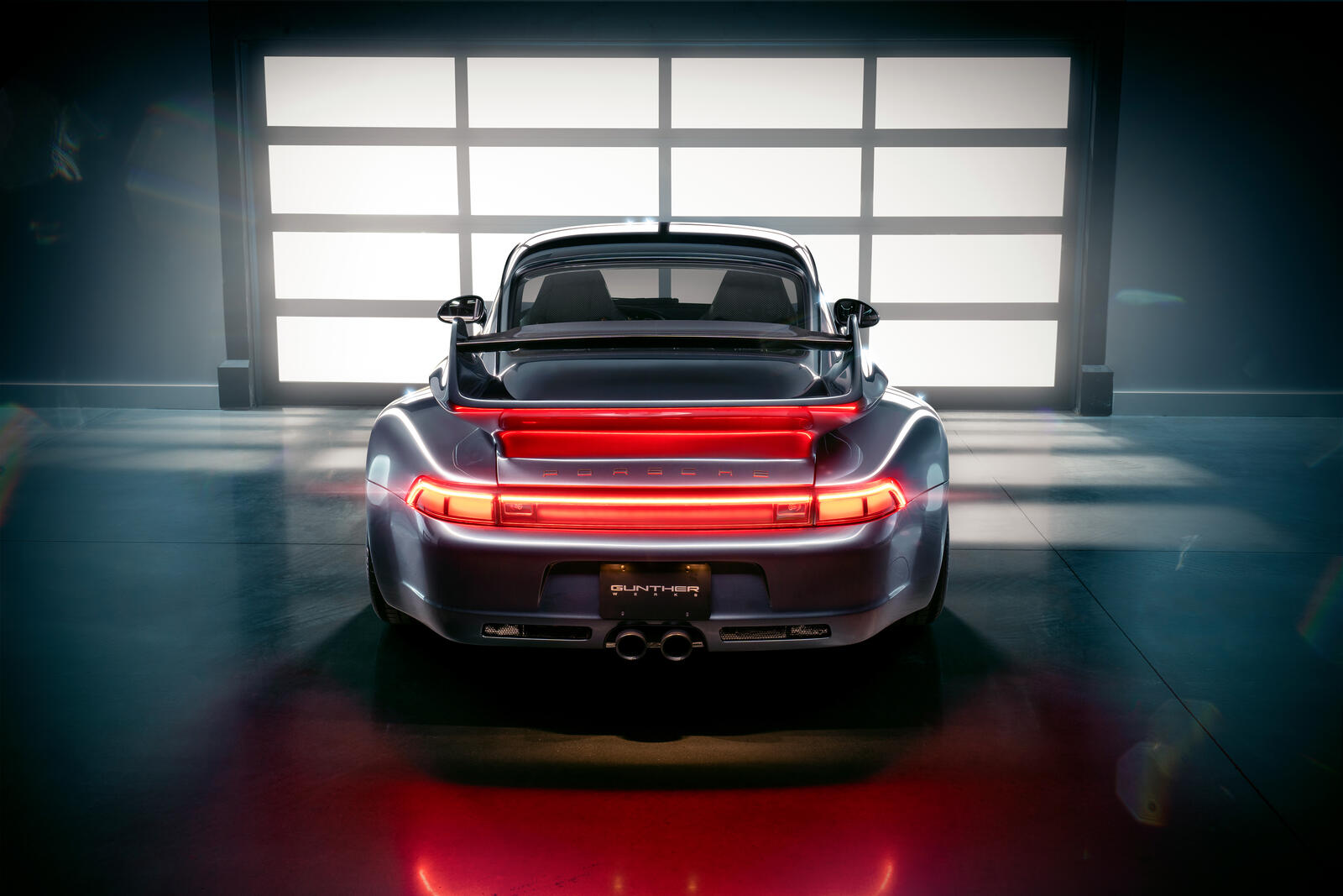Porsche 911 2022 года вид сзади