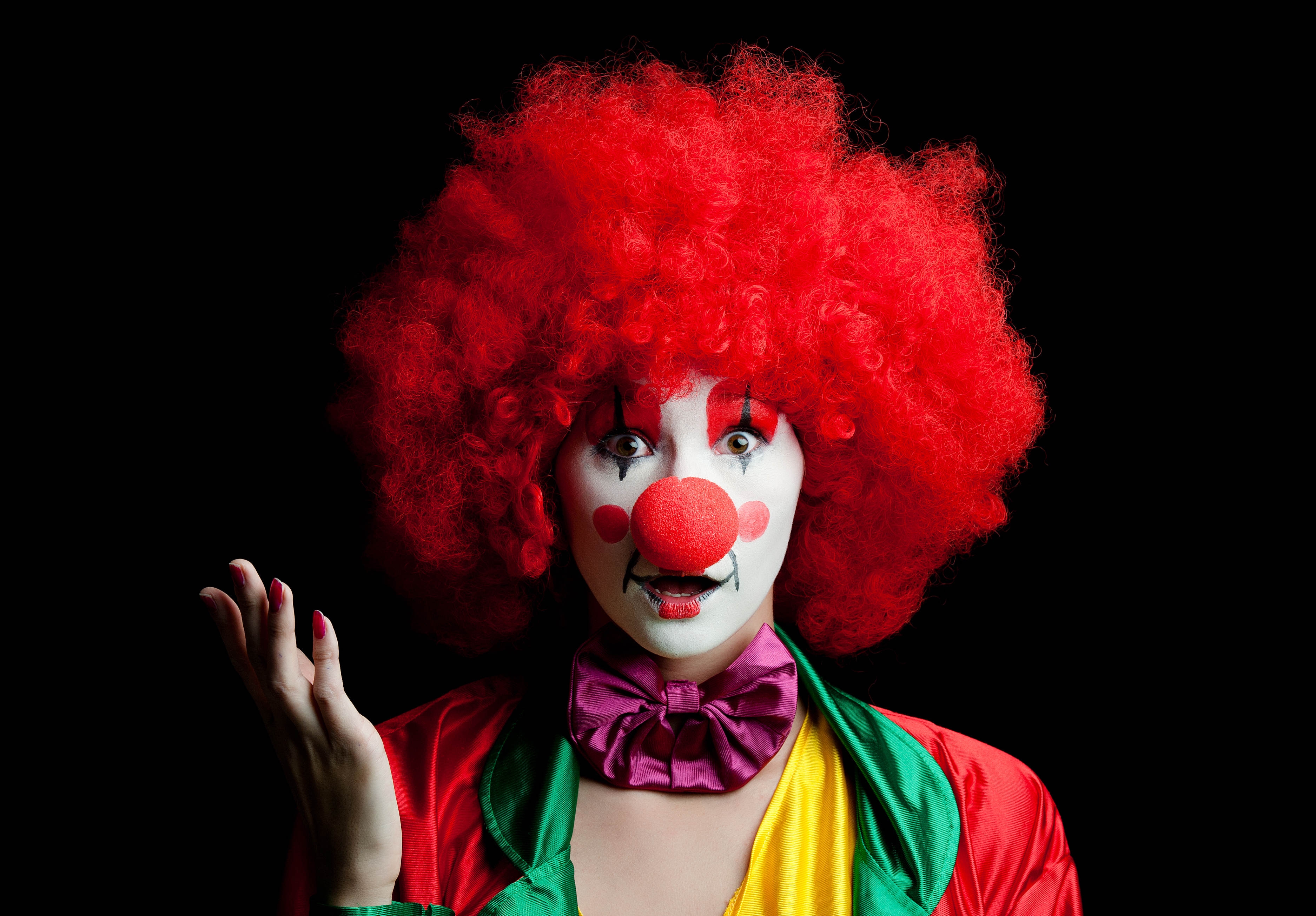 Wallpapers red hair clown black background on the desktop