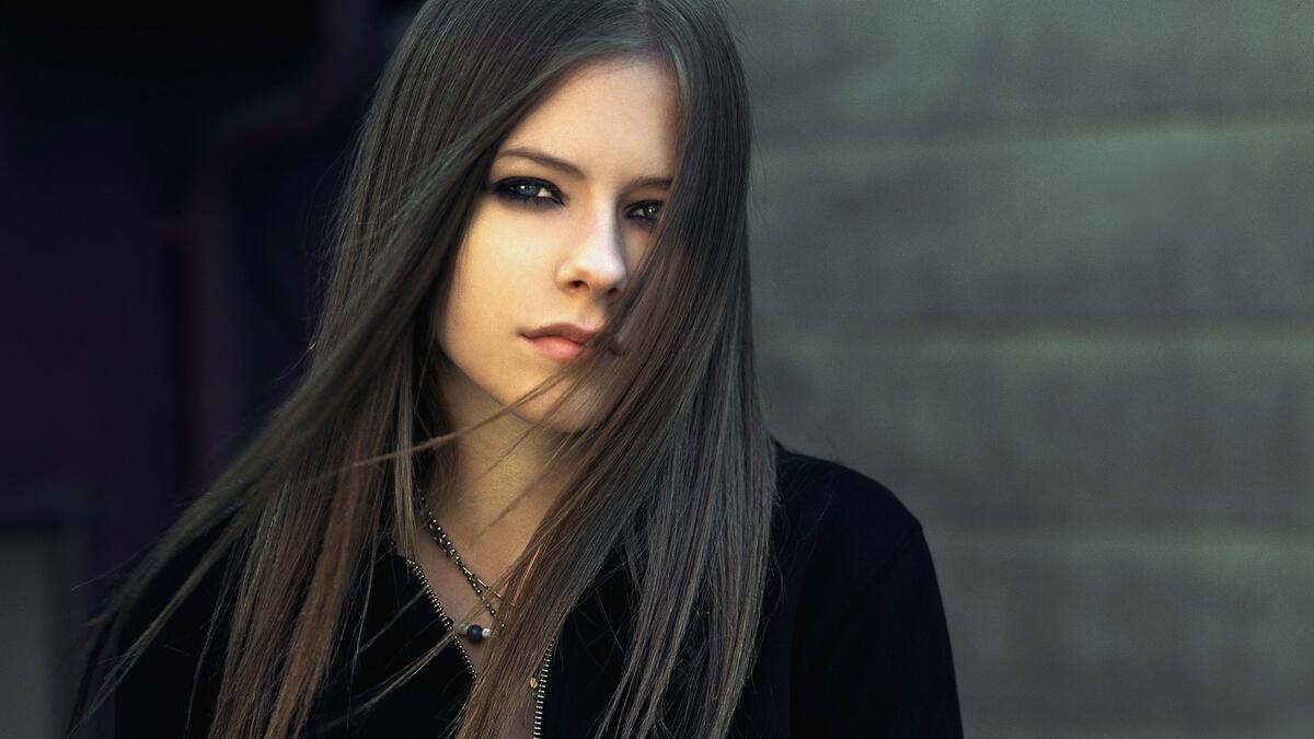 A portrait of brunette Avril Lavigne