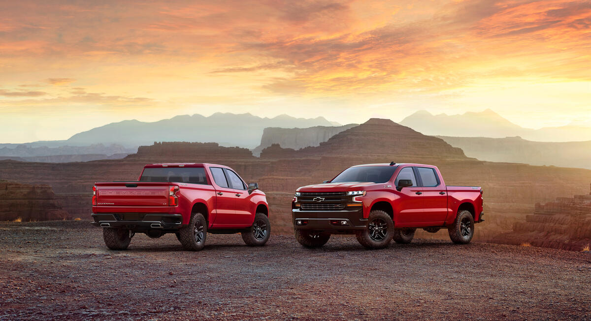 The 2019 Chevrolet Silverado in red during sunset
