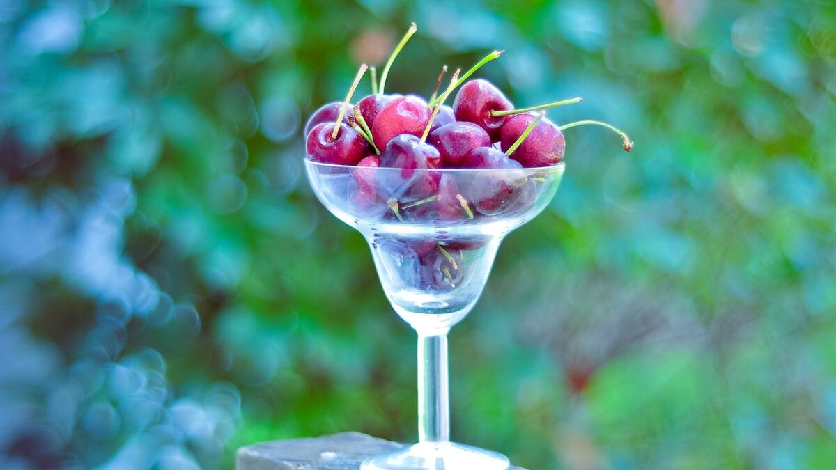A glass with a cherry