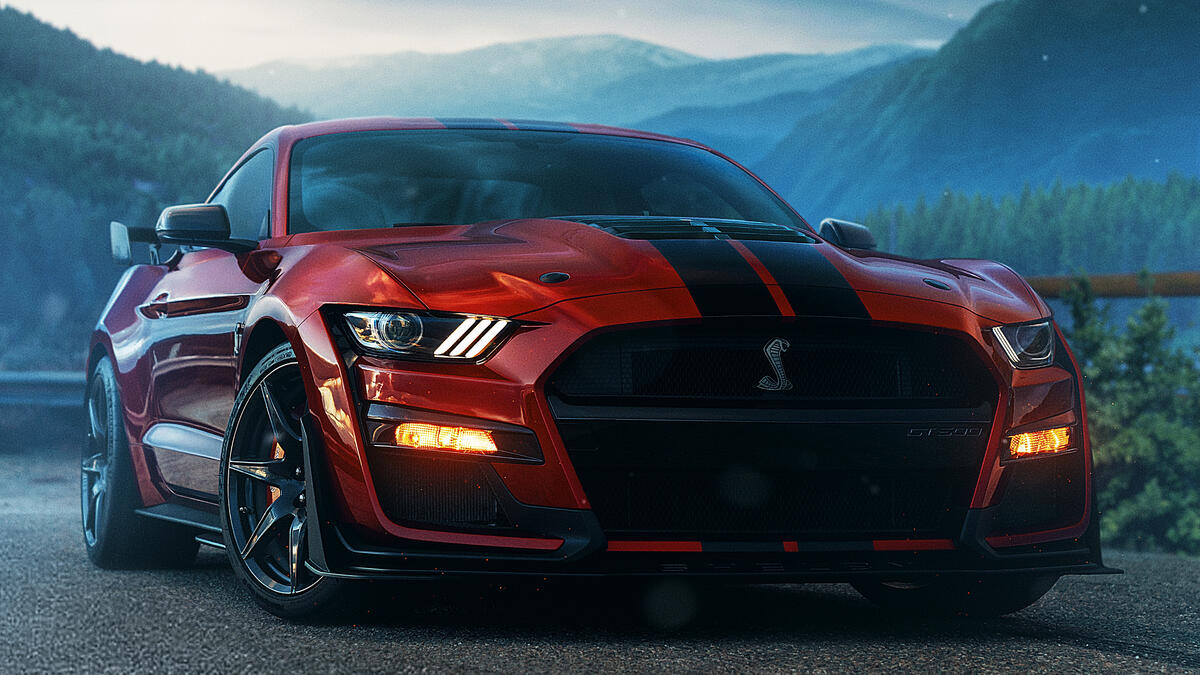 Cool red Ford Mustang with black stripes.