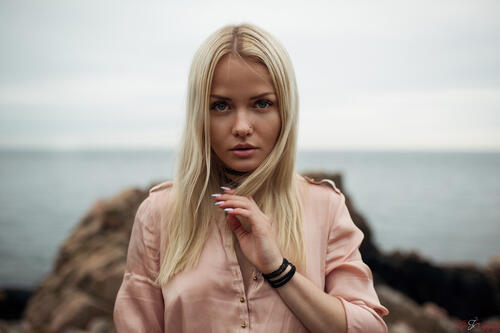 Picture of blonde Alicja Sedzielewska on the sea background