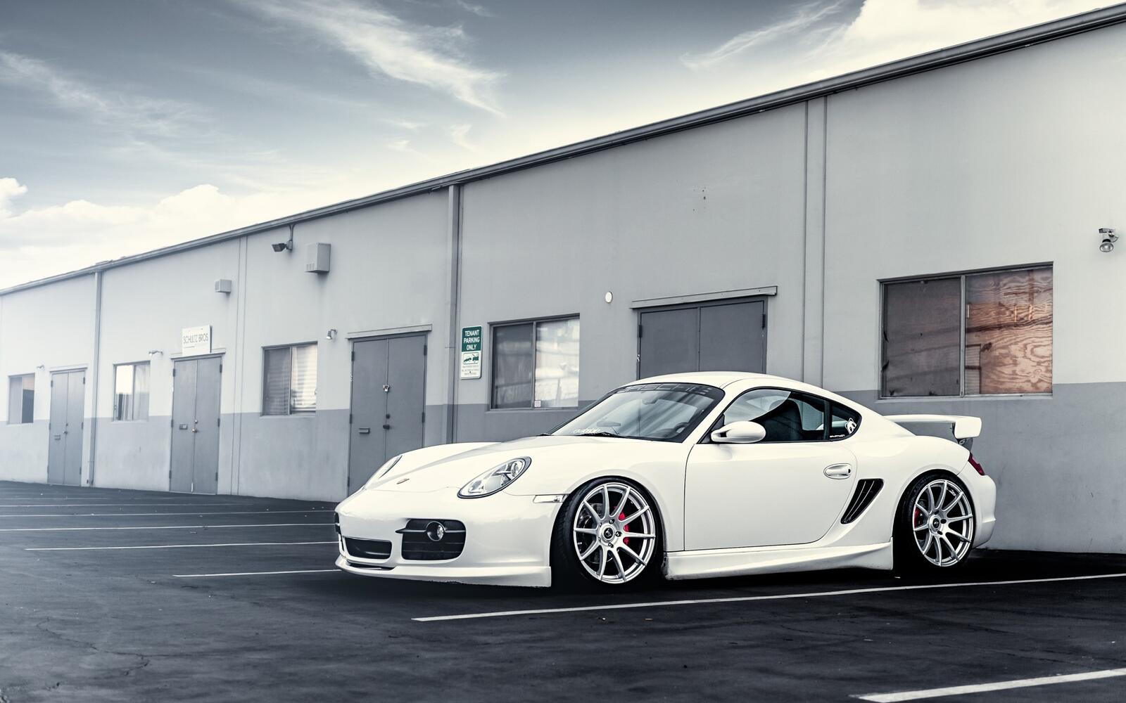 Free photo White Porsche in the parking lot