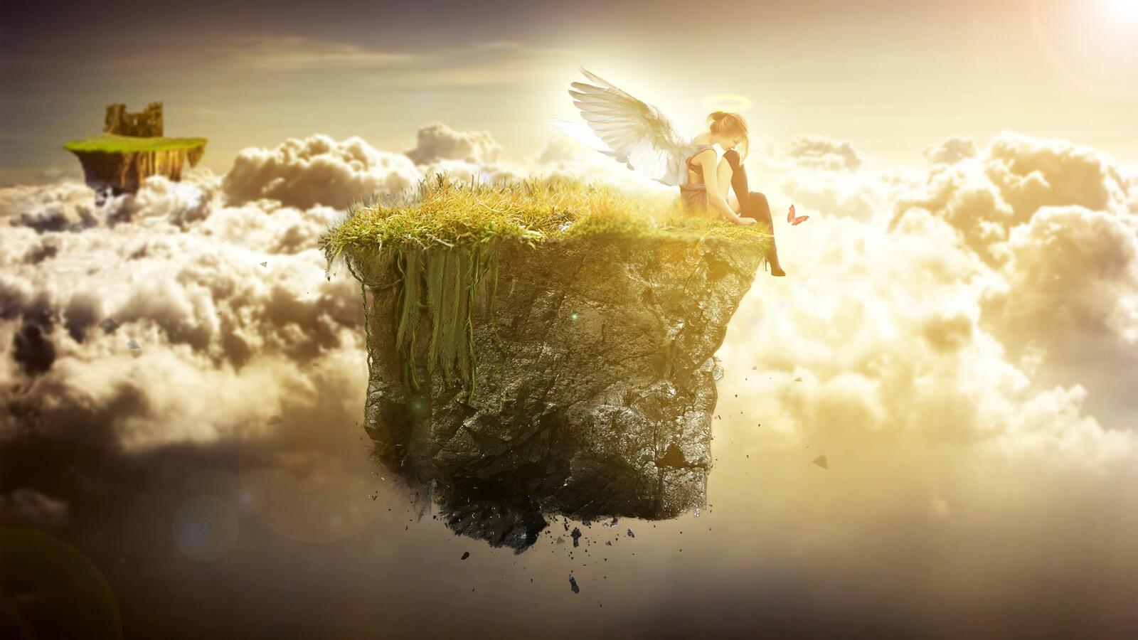 Free photo An angel sits on a levitating island in the clouds