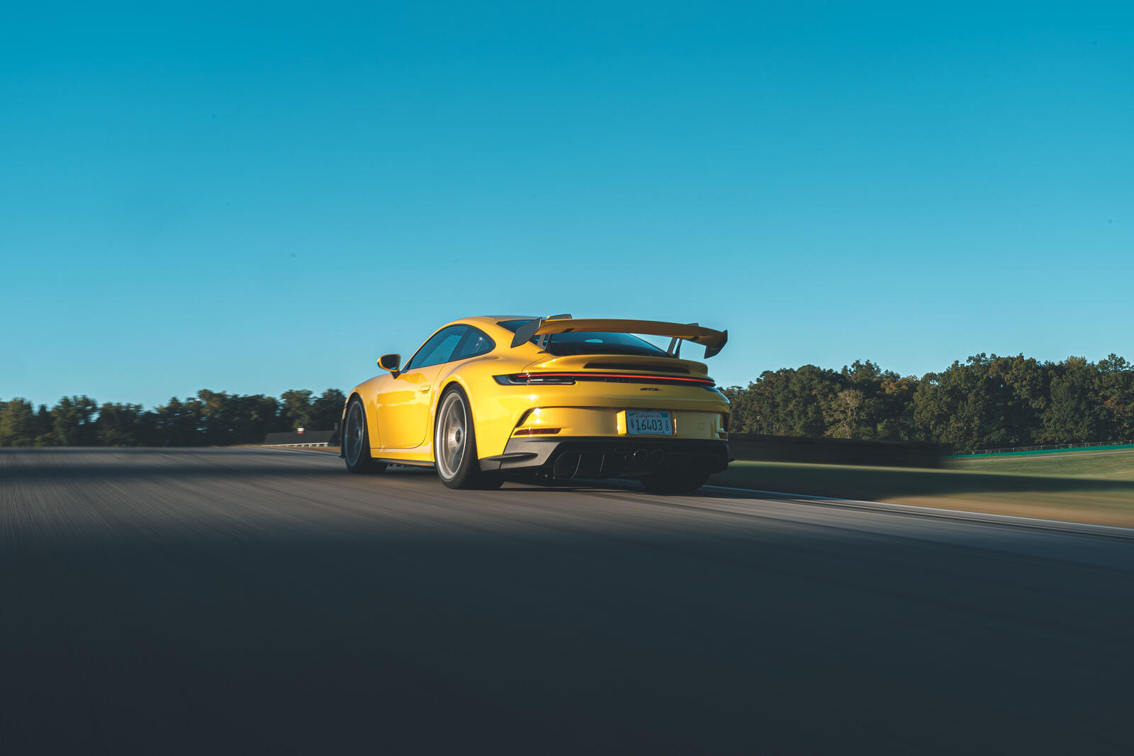 Free photo The Porsche 911 is pictured from behind