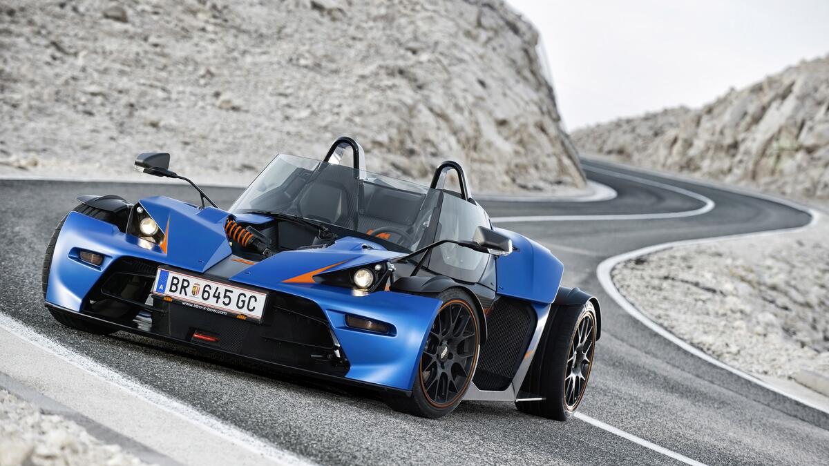 Ktm x-bow stands on a mountain road