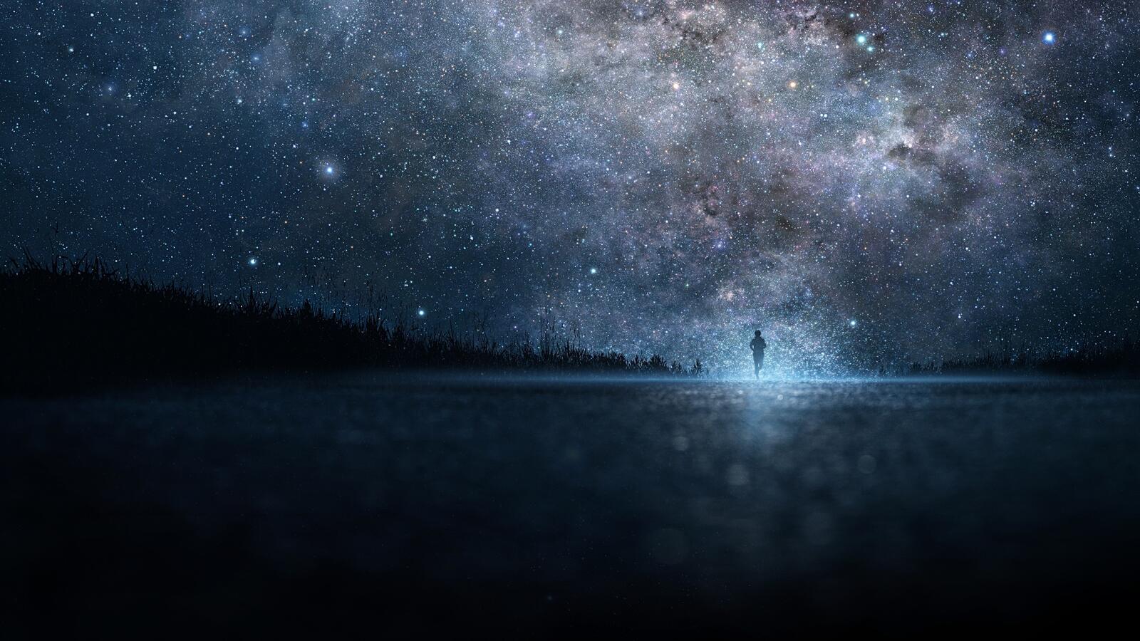 Бесплатное фото Силуэт мужчины на фоне звездного неба