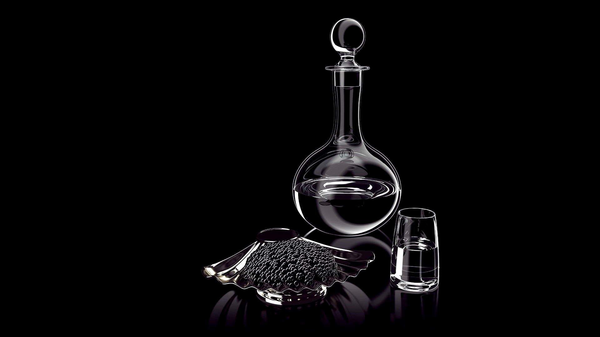 Free photo A decanter, a glass and some caviar