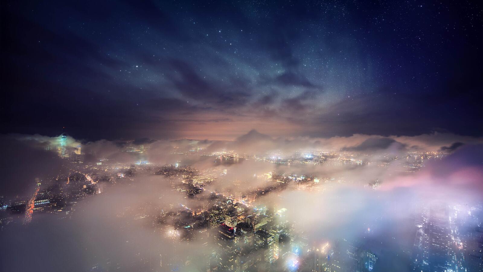 Wallpapers lights New York above clouds on the desktop