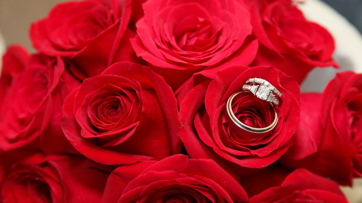 Roses and wedding ring