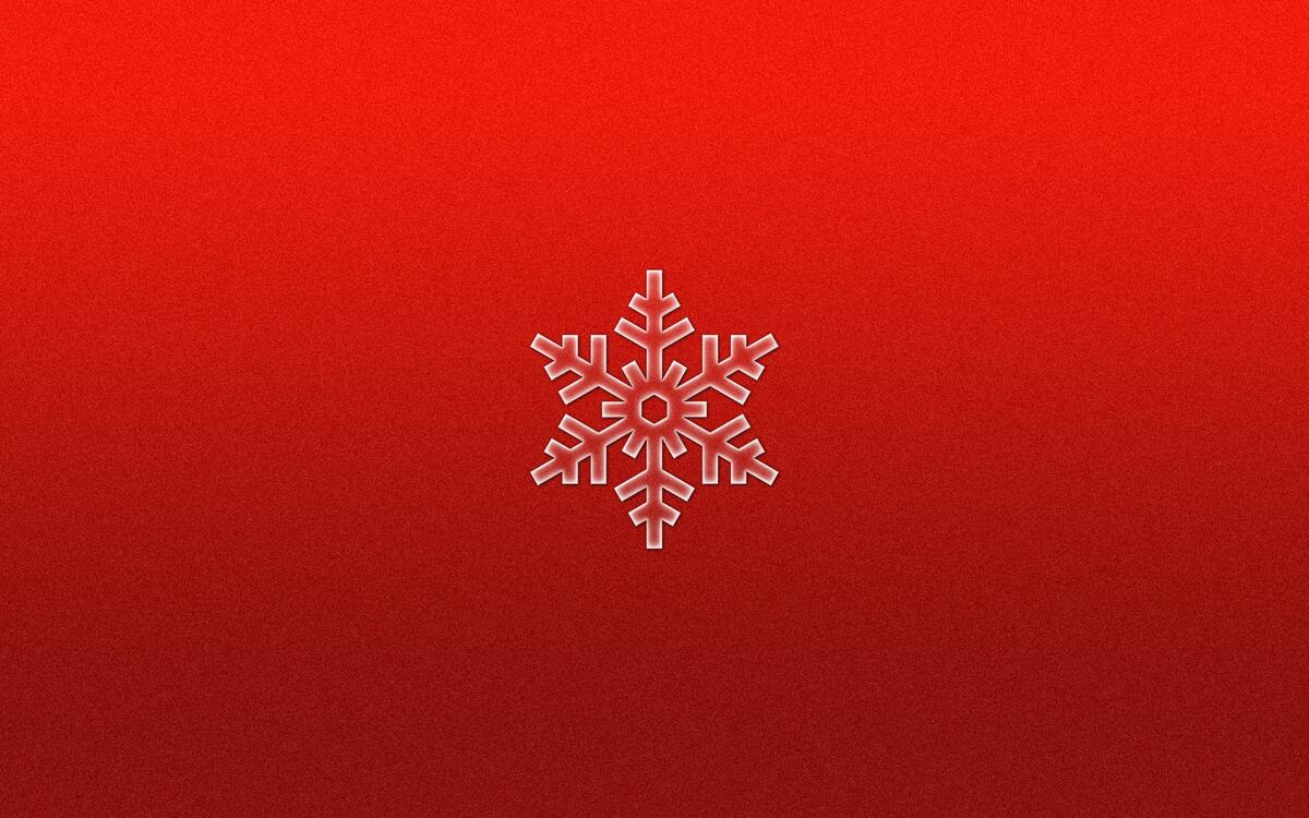 Абстрактная снежинка на красном фоне