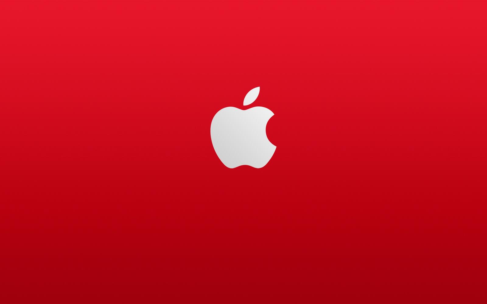 Бесплатное фото Логотип apple на красном фоне