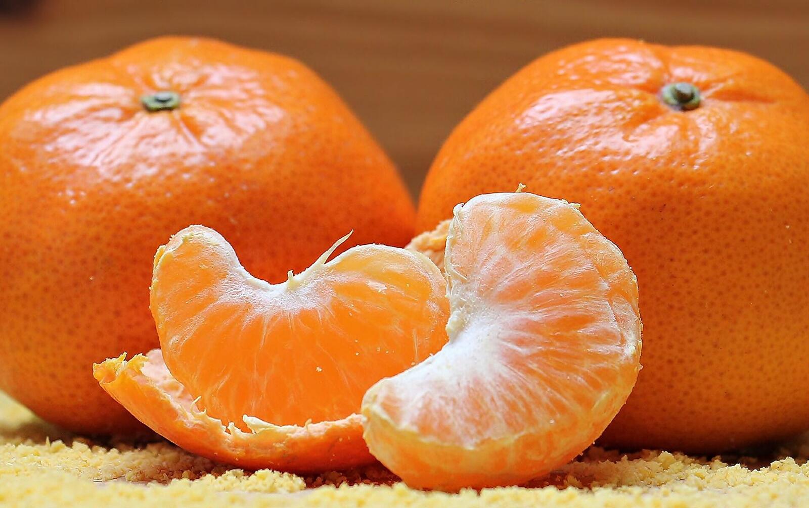 Wallpapers fruit tangerines slices of tangerines on the desktop