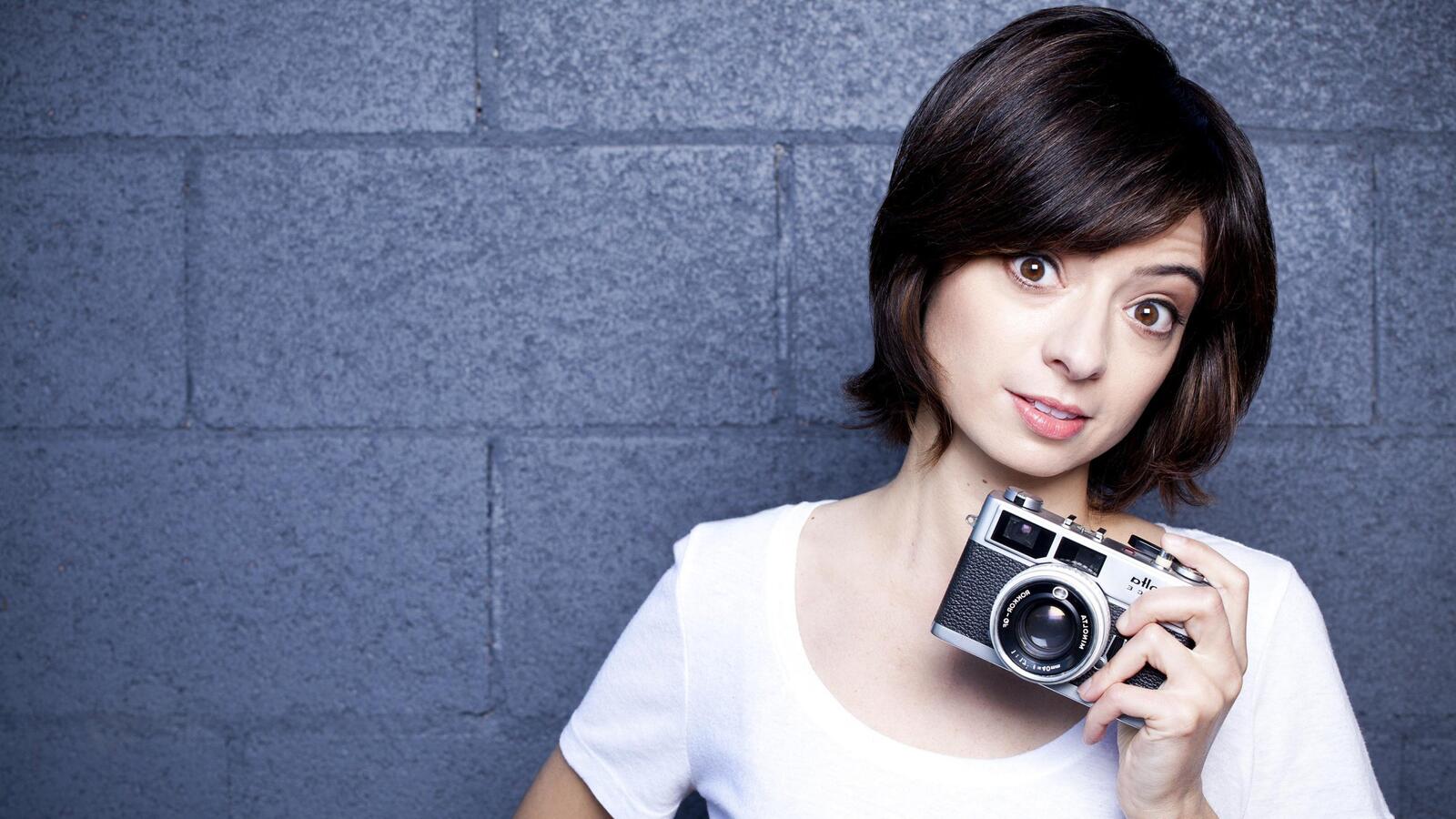 Free photo Kate Micucci with a camera.