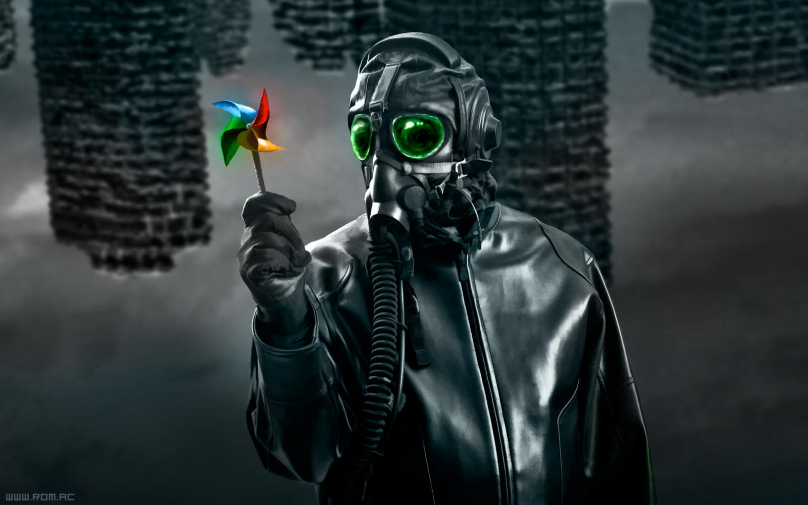 Free photo A man in a gas mask with a child`s toy