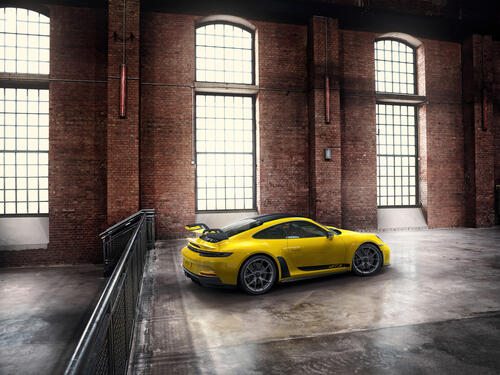 Yellow Porsche 911 GT3 R.